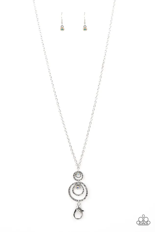 COUTURE Freak Multi Iridescent Rhinestone Silver Circle Lanyard Necklace Paparazzi Paparazzi Accessories Necklaces COUTURE Freak Multi Iridescent Rhinestone Silver Circle Lanyard Necklace Paparazzi Paparazzi Accessories Necklaces