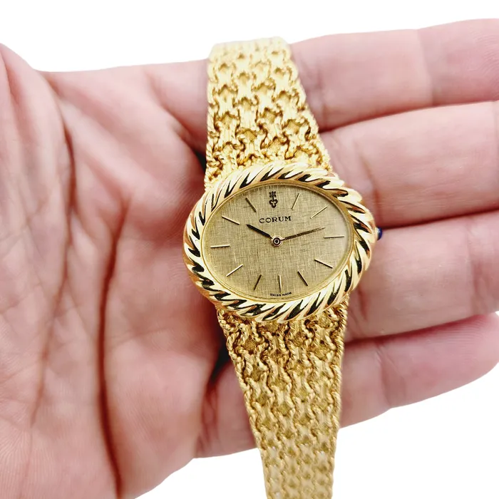 Ladies Corum 26mm x 30mm Oval Vintage 18K Yellow Gold Watch with Gold Dial and Weave Bezel PreOwned Corum PreStyled Sets