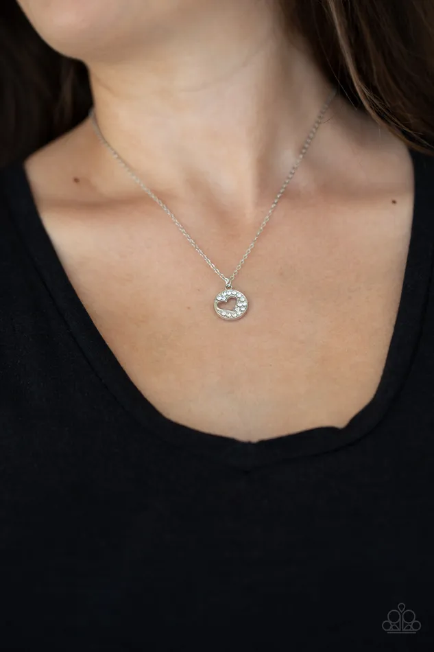 Paparazzi Accessories Necklaces Bare Your Heart White Rhinestone Heart Cutout Silver Necklace Paparazzi