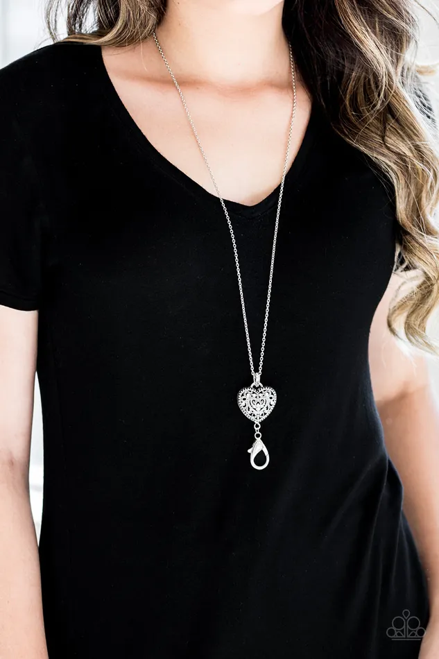 Paparazzi Accessories Necklaces Charmingly Casanova Paparazzi White Rhinestone Silver Heart Pendant Lanyard Paparazzi Accessories Necklaces Charmingly Casanova Paparazzi White Rhinestone Silver Heart Pendant Lanyard