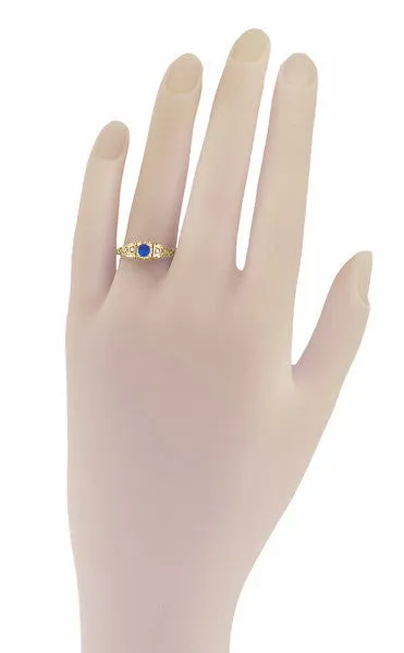 Rings Antique Jewelry Mall Dainty Filigree Art Deco Blue Sapphire and Side Diamond Engagement Ring in 14 Karat Yellow Gold Rings Antique Jewelry Mall Dainty Filigree Art Deco Blue Sapphire and Side Diamond Engagement Ring in 14 Karat Yellow Gold