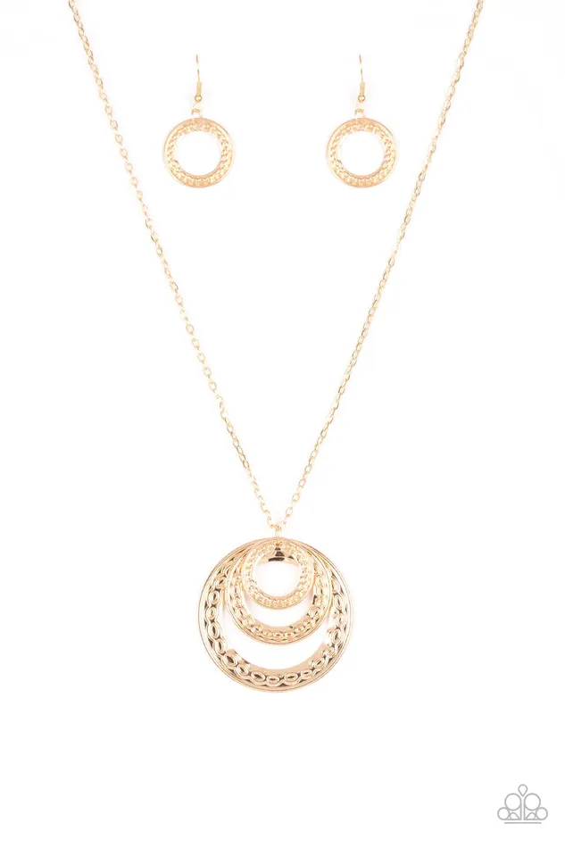 Savagely SheWolf Gold Tribal Circle Pendant Necklace Paparazzi Paparazzi Accessories Necklaces Savagely SheWolf Gold Tribal Circle Pendant Necklace Paparazzi Paparazzi Accessories Necklaces